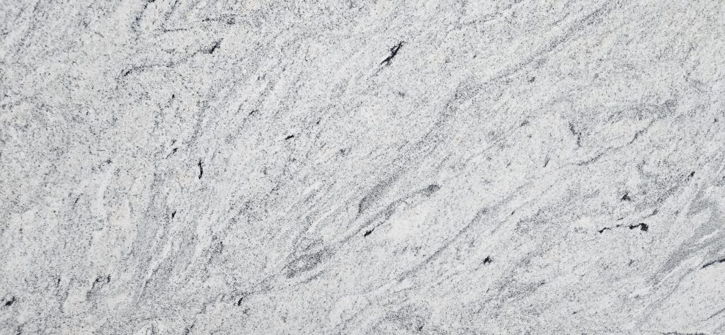 Mesmerizing combination of White, Grey and Black with swirly pattern granite